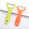 Originalidade fruta legumes peeler faca casa plástico gadget peeling portátil casa cozinha ferramentas acessórios