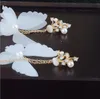 Belles longues boucles d'oreilles papillon blanc, clip d'oreille en plumes, accessoires pour robe de mariage en gaze