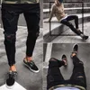 Men's Skinny jeans Casual Slim Biker Jeans Denim Knee Hole hiphop Ripped Pants Washed High quality Free Shipping