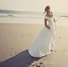 Tanie sukienki ślubne linia szuflada na szyję rękawy koraliki krystaliczne plażę bohemijskie kieszenie na długie samiz