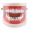 Fábrica inferior dentes grillz conjunto hip hop bling dental grills cz gelado para fora do dente boné jóias do corpo eua dentes inteiros access4666343