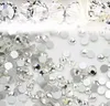 1440pcs / lot nagelkonst glitter rhinestones vit kristallklar flatback diy tips klistermärke pärlor nagel smycken tillbehör gratis frakt