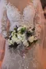 Arabia Dubai Pearls Beads Wedding Dresses Sparkly Crystal Lace Applique Long Sleeve Wedding Gowns 2018 Vintage V-Neck Mermaid Wedding Dress