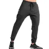 Jesień Zima Nowy Mężczyźni Spodnie Gyms Casual Elastyczne Mężczyzna Fitness Trening Spodnie Skinny Spodnie dresowe Spodnie Jogger Spodnie z M-XXL