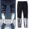 Jeans skinny da uomo Jeans da motociclista slim casual Denim Fori per il ginocchio pantaloni strappati hiphop lavati Alta qualità233t