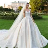 Retro-Spitze-Prinzessin-Hochzeitskleider, Ballkleid, Perlenstickerei, formelle Dubai-Arabische Brautkleider, heller Champagner, elegante Flügelärmel