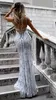 Hot Sale Silver Sequined Prom Dresses 2019 Sexy Mermaid Deep V Neck Backless Formal Evening Gown Celebrity Party Red Carpet Dress for Women