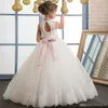 Flickor Holy Communion Klänningar Beaded Pink Vacker Lång Little Flower Girls Pagant Graduation Klänningar Kids Lace Hem