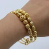 Bracciale rigido regolabile da donna in stile classico con perline intagliate da 2 pezzi, regalo regolabile in oro giallo 18 carati