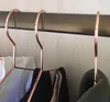 China Leverancier Douane Multipurpose Dry Cleaning Messing Goedkope Bulk Elegante Rose Gold Clothes Hanger Wire Copper Jas Hanger