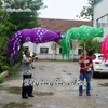 Ballons de défilé personnalisés 2.5 m de longueur marionnette de pieuvre gonflable Costume de marche personnalisé pour la fête à thème de l'océan