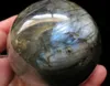 boule de sphère de cristal de quartz naturel labradorite arc-en-ciel bleu feu en mouvement