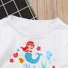 Nowe Baby Girls Sets Summer Moda Cartoon Mermaid Drukowane Krótki Rękaw T Shirt + Tassel Krótkie spodnie 2 Sztuk Zestaw Dzieci Cute Princess Casual Clo