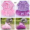 かわいいドッグアパレル犬のウェディングドレス弓パターン新しい夏の犬の王女チュチュドレスペットピンク紫のスカート衣料品xs -xxl dhl無料