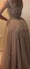 オーバースカートクリスタルビーズアップリケ半袖パーティードレスサウジアラビア優雅なセクシーなイブニングドレスの華やかなチュール人魚のドレス