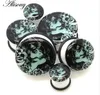 Alisouy 2pcs Unisex Acrylic Glowing Luminous Skull Dinosaur Ear Tunnels Ear plugs Ear Stretching Body Jewelry Piercing