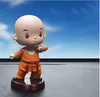 Car doll ornaments creative resin material cute cartoon spring shook his head small monk car interior decoration accessories