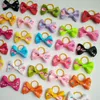 100 unids Diseño Lindo Amor Perros Gatos Accesorios Para el Cabello Hechos A Mano de Alta Calidad Para Mascotas Arcos de Pelo con bandas de goma Accesorios para el Aseo