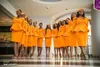 Uniek ontwerp bruidsmeisje jurken voor bruiloft oranje kleur stewardess uniform knielengte meid van eer jurk vrouwen formele feestjurk