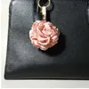 Bonito artesanal Camellia Hydrangea Flor Keychain Tassel Pu Chaveiro Chaveiro Carro Chaveiro Anel de Chaveiro Saco de Mulheres Charme Pingente