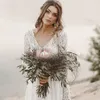 Fairy Stunning Deep V Neck Vintage Beach Wedding Dresses Lace Long Sleeve Full Length Summer Boho Sexy Backless Bridal Gowns Pretty Country