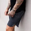 Whole Mens Fitness Cotton Shorts Novos academias casuais de moda CrossFit Fisionamento de bodyout Joggers masculino calças curtas Sweatpan7423628