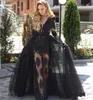 2018 Sexig svart sjöjungfrun kvällsklänningar bär v nacke nyckelhål Långärmade Tulle Lace Appliques Beaded See Through Overskirts Party Prom Crows