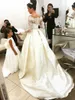 2018 en linje bröllopsklänningar av axel illusion spets topp pärlstav kristall sheer långa ärmar sopa tåg täckt knapp formella brudklänningar