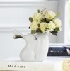 Jarrón de flores de conejo creativo de cerámica blanca, manualidades decorativas para el hogar, decoración de habitación de niños, regalos de boda, figuritas de animales de porcelana