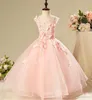 Flower Girls Dresses for Weddings Billiga High Low Ruffles Princess Party Girls Pageant First Communion Dress for Kids Teens