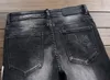 Najwyższej jakości męska karta do gry haft luksusowe dżinsy projektant mężczyźni dżinsy dziura znana marka Slim Fit Mens Drukowane Dżinsy Dżinsy Spodnie 15019-1