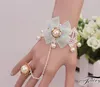 Hot style Lolita original new white lace pearl handmade bracelet with a finger chain is fashionable and elegant