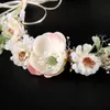 Fiori bianchi, ghirlande, abiti da sposa, fiori secchi colorati, copricapo, fasce per capelli