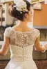 Abiti da sposa vintage stile anni '50 Illusion Neck Cap maniche Pizzo Tulle Lunghezza alla caviglia Abito da sposa corto economico con fiore fusciacca