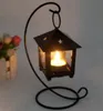 Venta al por mayor Candelabro de hierro de estilo europeo Marroquí Boda Lámpara de viento Lámpara romántica colgante Colgante Candelabro (sin velas)