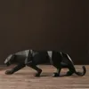 Liten harts svart panther skulptur figur hantverk hembord dekor geometrisk vilda djurliv leopardstaty hantverk