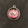 Blanda Runda Tillbehör Glas AKA Sorority Crest Charm för Armband och Halsband Sorority Charm 20st / Lot