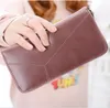 Ny lång plånbok för kvinnor, koreansk version av blixtlåsplånboken liten fräsch läderplånbok multifunktionell handväska