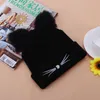 Cálido sombrero de invierno para mujer lindo sombrero con orejas de gato Skullies sombreros gorros con pompones gorro femenino de lana negro tejido trenzado sombrero de piel Y16459997