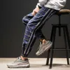 4 colori uomo streetwear hip hop pantaloni scozzesi casual pantaloni uomo donna moda pantaloni harem larghi pantaloni coppia pantaloni sportivi jogger