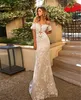 Sexig Spaghetti sjöjungfru bröllopsklänningar av axelbelagda knappar Lace Applique Sweep Train Bridal Gowns Vestidos de Noiva