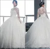 High Neck Lace Ball Gown Wedding Dresses Vintage Royal Long Sleeves Tulle Applique Sweep Train Bridal Gowns With Buttons BA3955