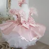 Прекрасные платья для девочек-цветочниц. Многоцветное бальное платье для детей. Розовое первое причастие с большим бантом.