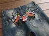 Neue Designer Männer Jeans Italian Rose Gestickte Jeans Slim Fit Herren Gedruckte Biker Denim Pants