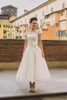 2018 Ny Vintage A Line Wedding Dresses Scoop Neck Kort ärmar TEA Längd LACE Appliced ​​Garden Wdding Brida klänning
