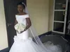 로맨틱 아프리카 인어 웨딩 드레스는 어깨에서 벗어나 구겨지다 Tulle Beach Bridal Dress 두바이 백작 베일이없는 웨딩 드레스 카운트