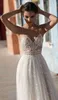 Gali Karten Beach Wedding Dress High Split Spaghetti Illusion Sexig Boho Bröllopsklänningar Sop Train Pearls Spets Backless Bohemian Bride