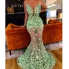 Green Green See przez Prom Dresses Sexy Sheer Neck Aplikacje Zroszony Suknie Wieczorowe Syrenka Długość Floor Długość Tulle Formalna Party Dress