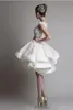 Krikor Jabotian Ny Ankomst Billiga Kort Lace Bröllopsklänningar 2019 Bateau Cap Sleeves Baklösa Knee Längd En Linje Strand Brudklänningar