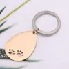 Mode-sieraden accessoires hond poot sleutelhanger, poot print sleutelhanger, hond poot, huisdier sleutelhanger custom gift roestvrijstalen sleutelhanger sieraden